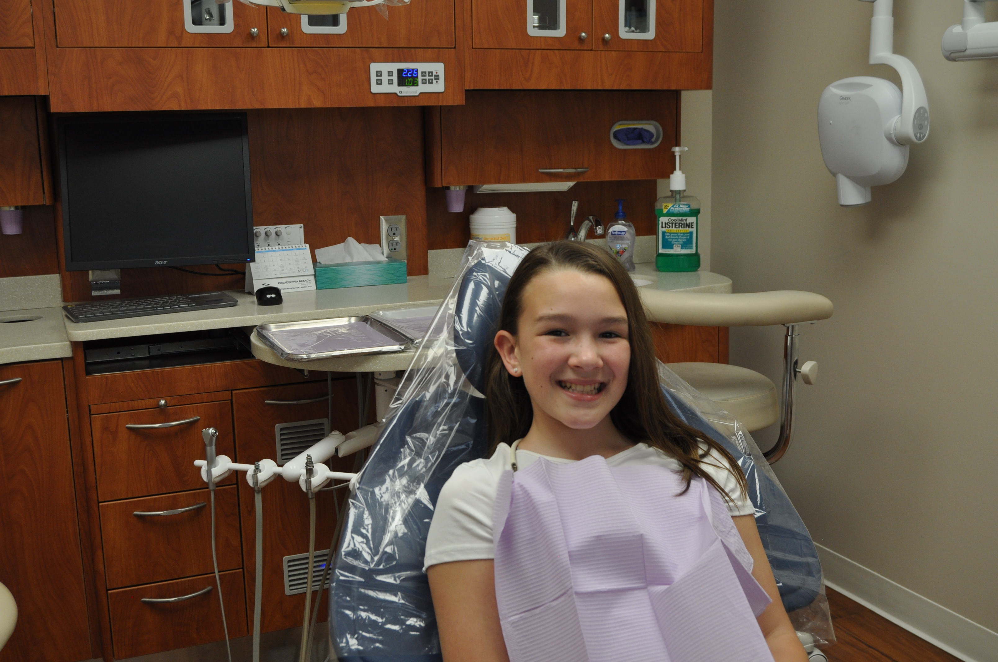 Girl in Dentist Chair Smiling